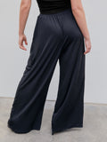 Plus Size Casual Pants, Women's Plus Solid Elastic High Rise Medium Stretch Loose Fit Wide Leg Trousers With Pockets