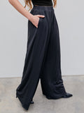 Plus Size Casual Pants, Women's Plus Solid Elastic High Rise Medium Stretch Loose Fit Wide Leg Trousers With Pockets